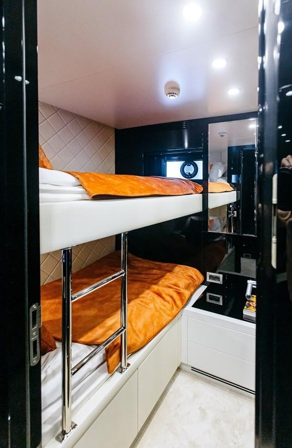 a bed in a display case aboard BERING 70 LEVANNA Yacht for Sale