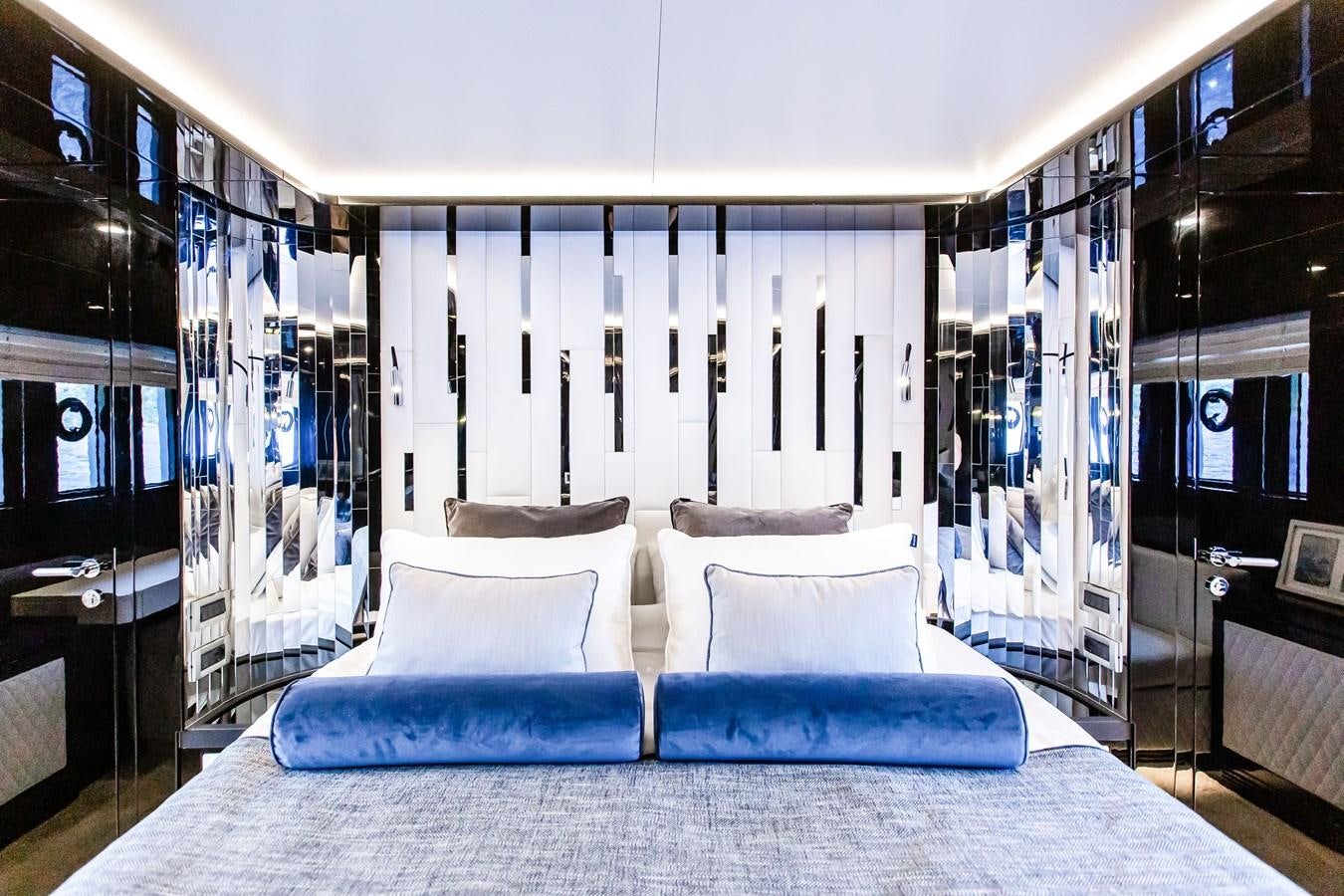 a bed in a room aboard BERING 70 LEVANNA Yacht for Sale