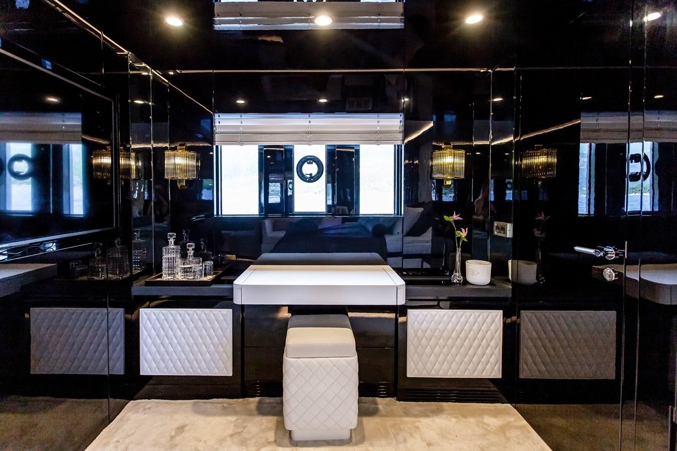 a large kitchen with a large window aboard BERING 70 LEVANNA Yacht for Sale