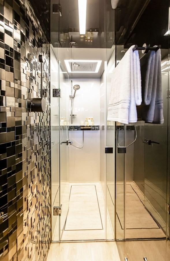 a bathroom with a sink and a mirror aboard BERING 70 LEVANNA Yacht for Sale