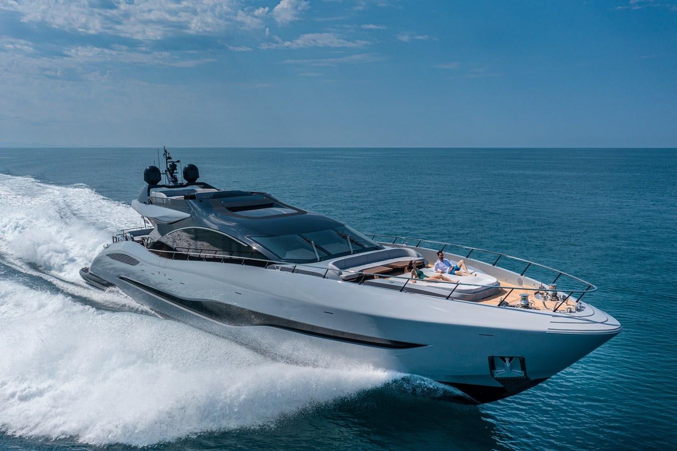 a white yacht on the water aboard MANGUSTA MAXIOPEN 104 REV #04 - EREIVA - CAREFULLY USED Yacht for Sale