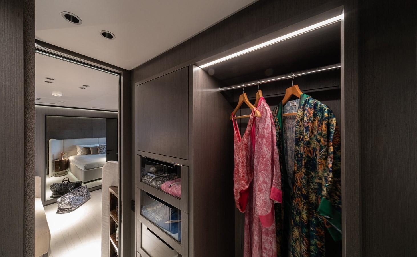 clothes on a rack aboard MANGUSTA MAXIOPEN 104 REV #04 - EREIVA - CAREFULLY USED Yacht for Sale