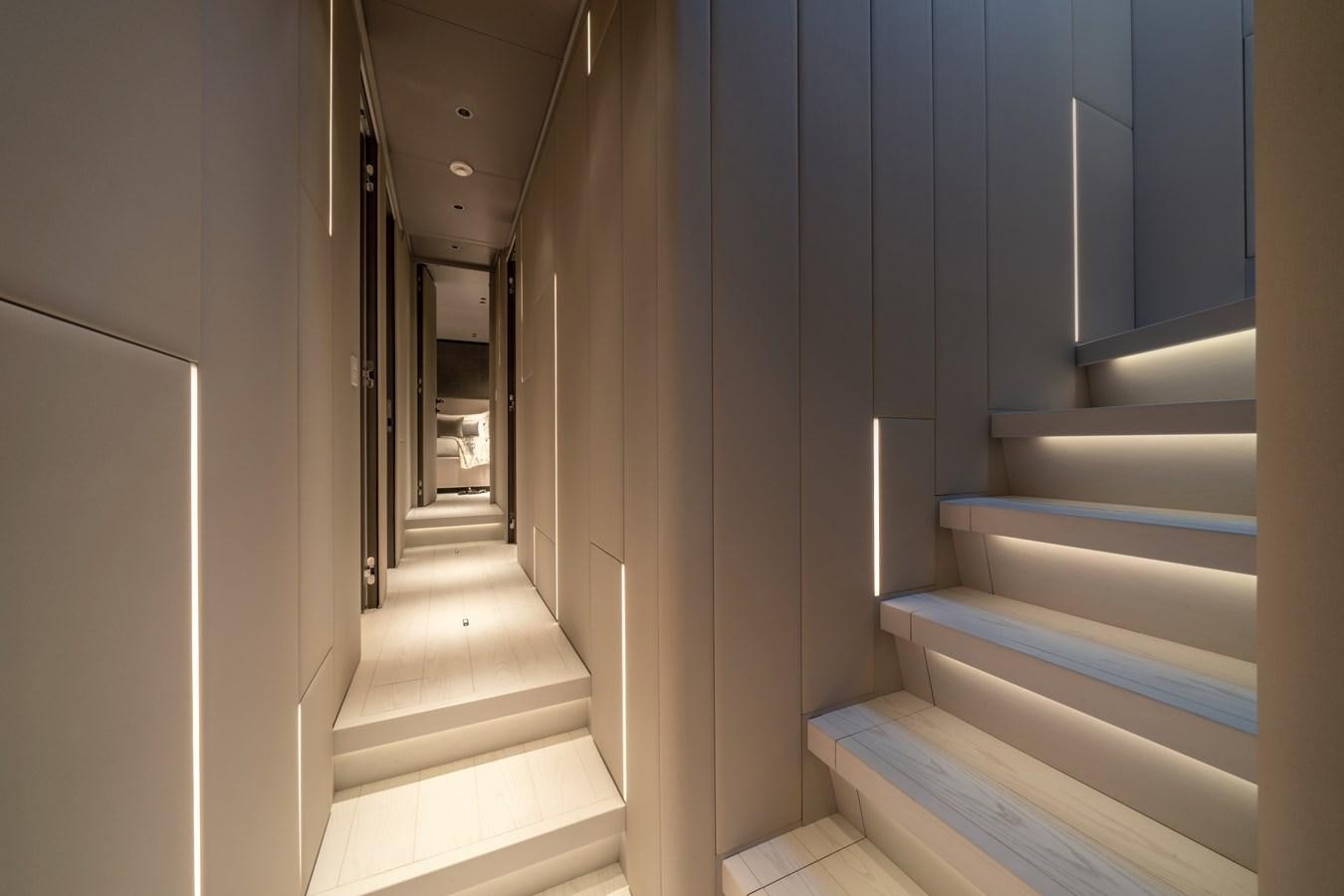 a hallway with white walls aboard MANGUSTA MAXIOPEN 104 REV #04 - EREIVA - CAREFULLY USED Yacht for Sale