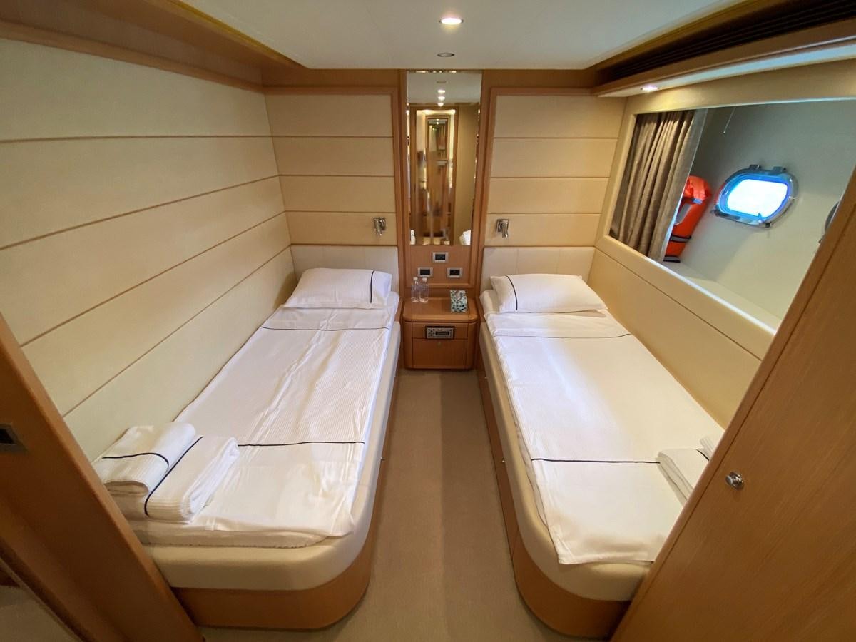 a room with two beds aboard BMO Yacht for Sale