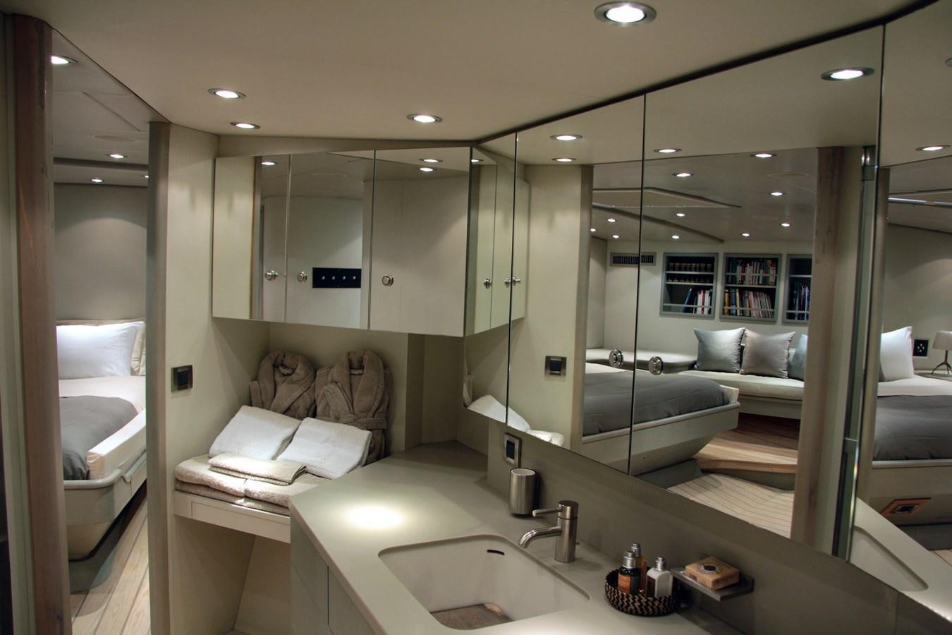 a bathroom with a large mirror aboard IEMANJA Yacht for Sale
