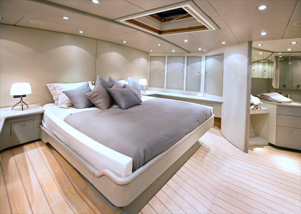 a bed in a room aboard IEMANJA Yacht for Sale