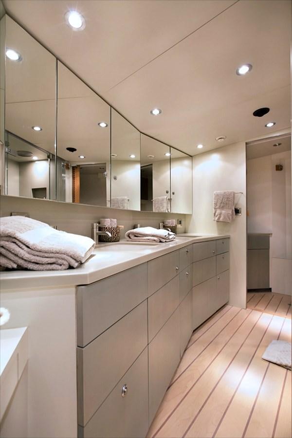 a bathroom with a large mirror aboard IEMANJA Yacht for Sale