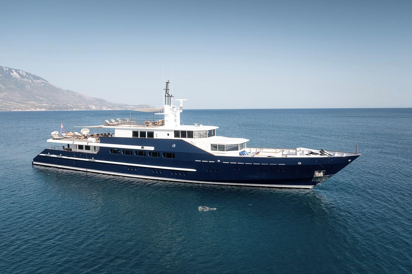 a large boat in the water aboard KORU Yacht for Sale