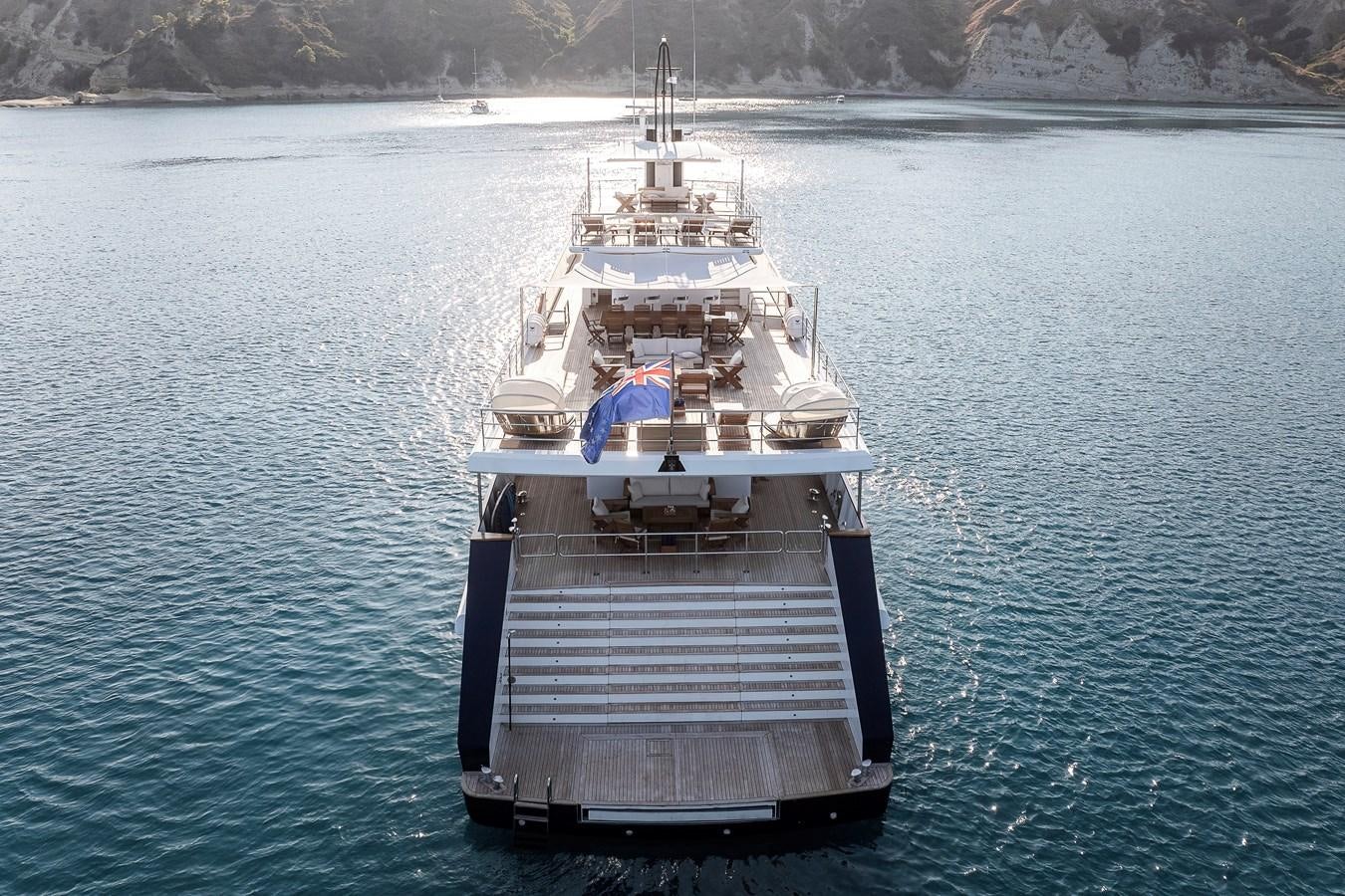 a large ship in the water aboard KORU Yacht for Sale