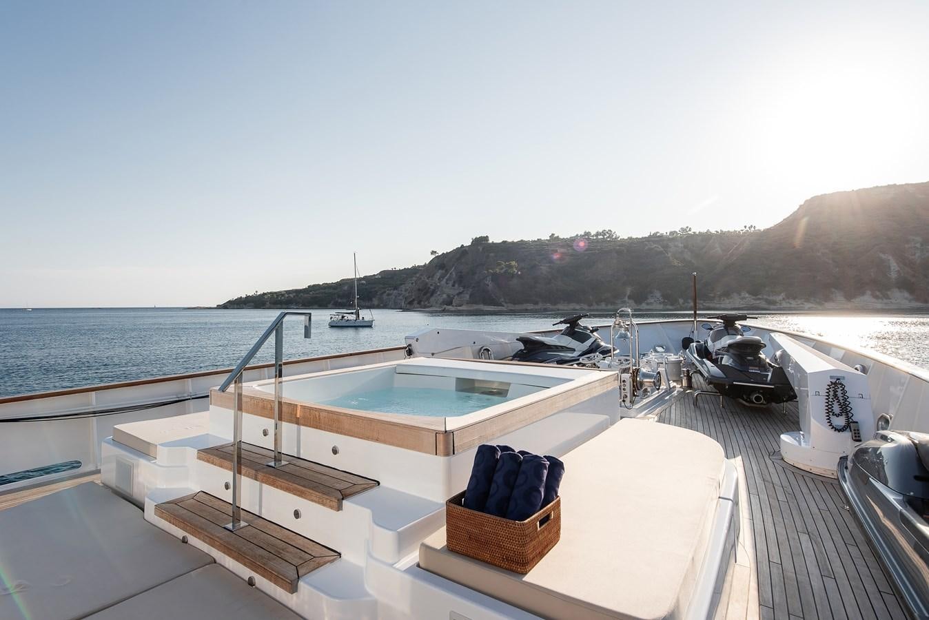 a boat on a deck aboard KORU Yacht for Sale