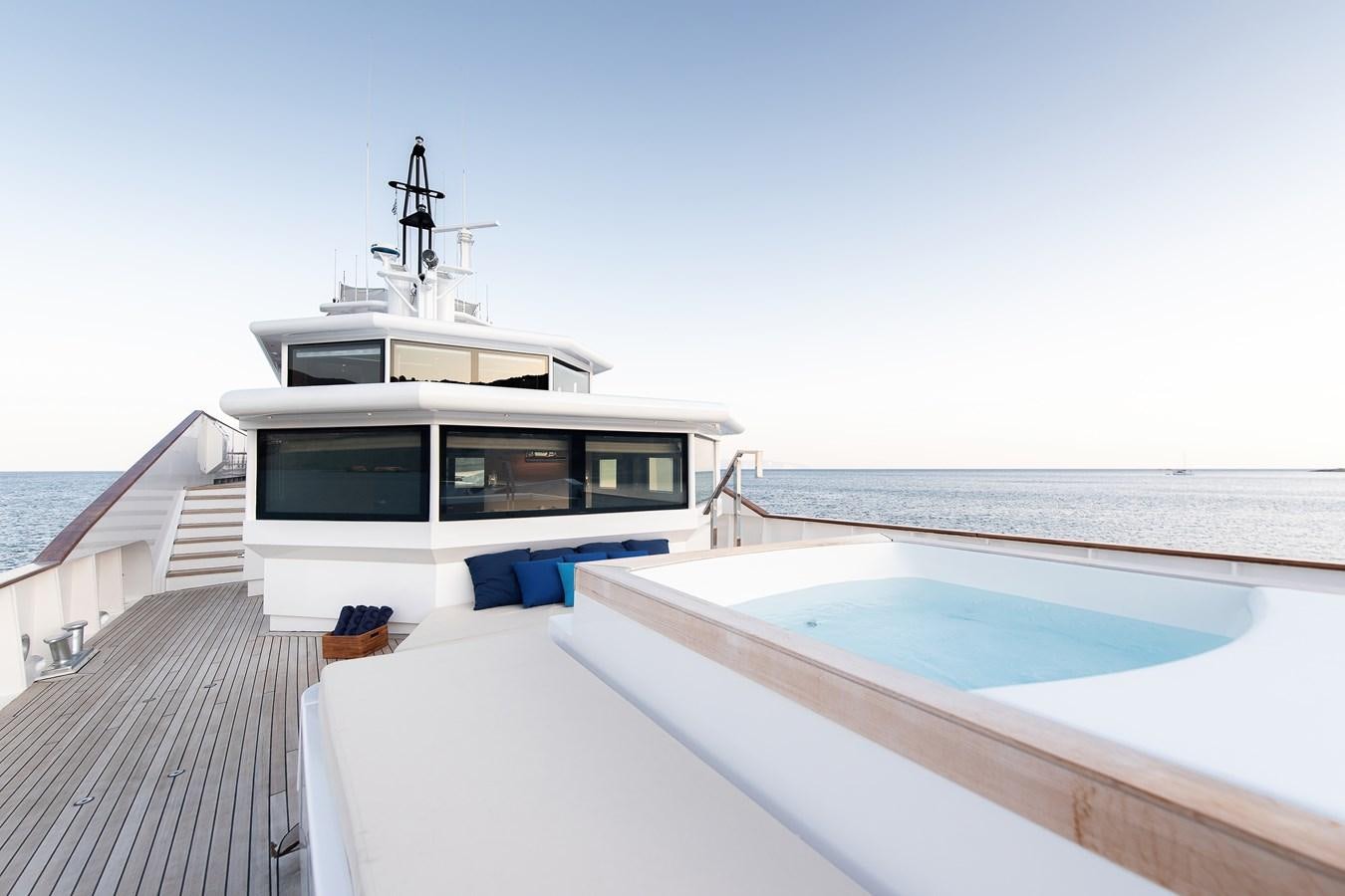 a boat on a dock aboard KORU Yacht for Sale