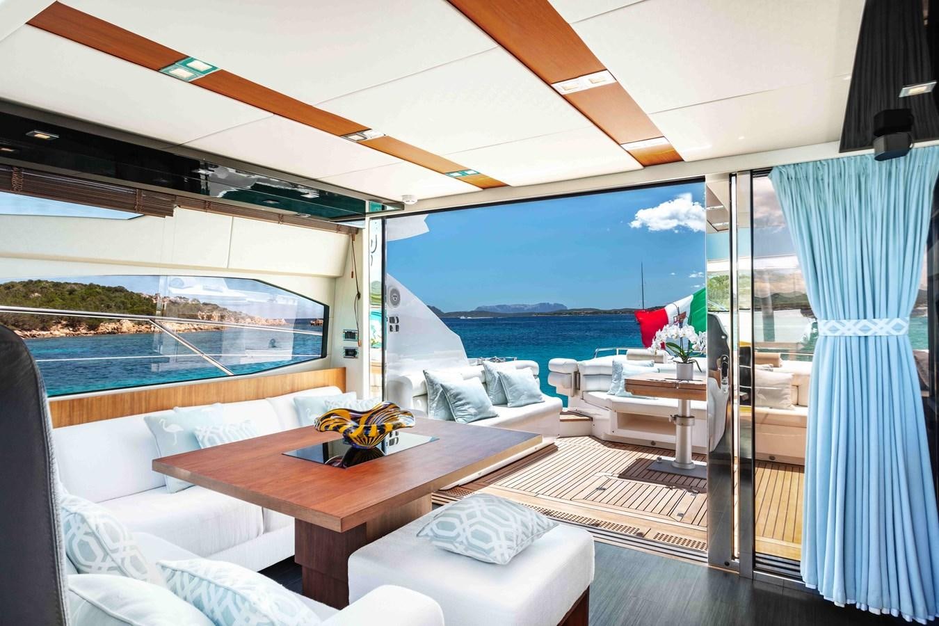 a room with a view of the ocean and the deck aboard SARAH Yacht for Sale