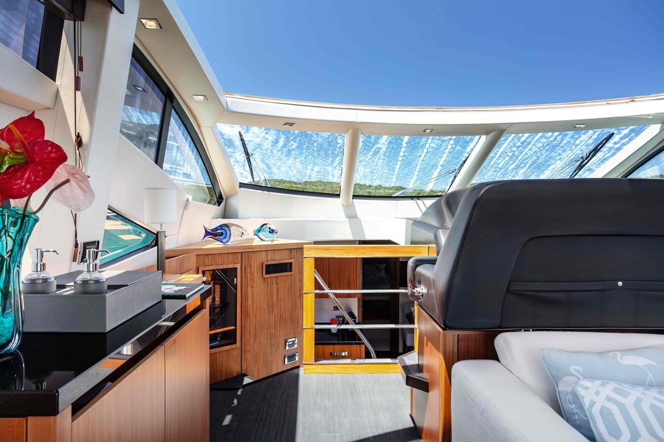 a room with a bed and desk aboard SARAH Yacht for Sale