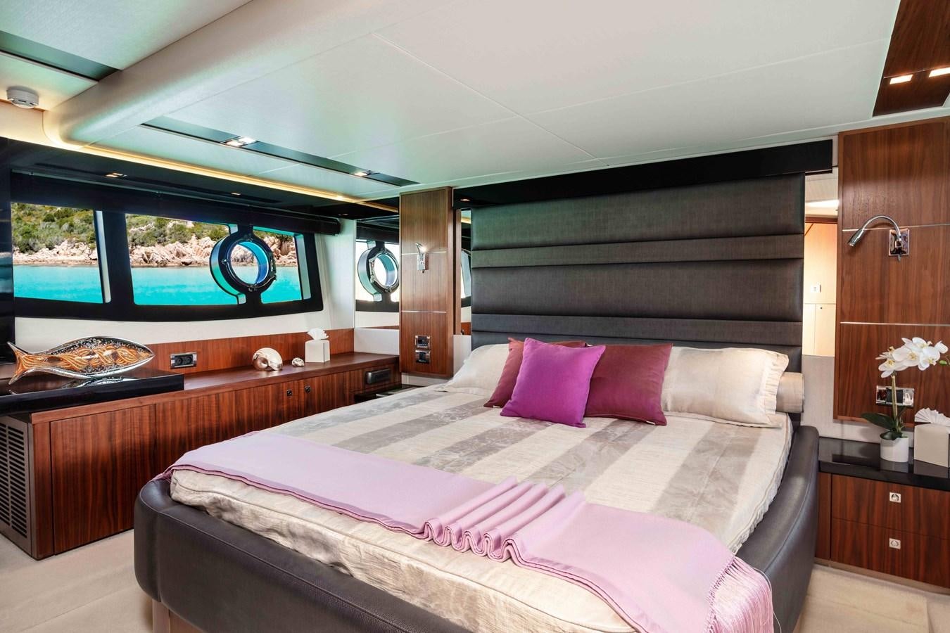 a room with a bed and a window aboard SARAH Yacht for Sale