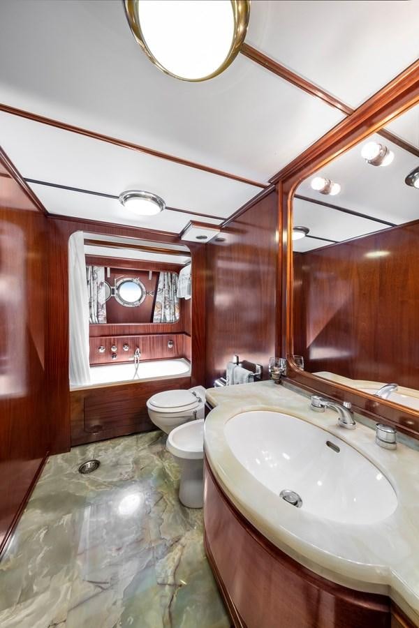 a bathroom with a sink and toilet aboard ATHINA Yacht for Sale