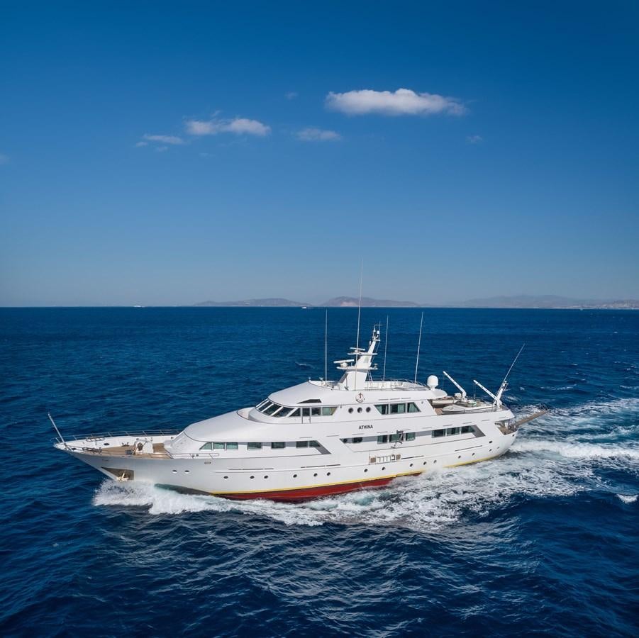 a white boat in the water aboard ATHINA Yacht for Sale