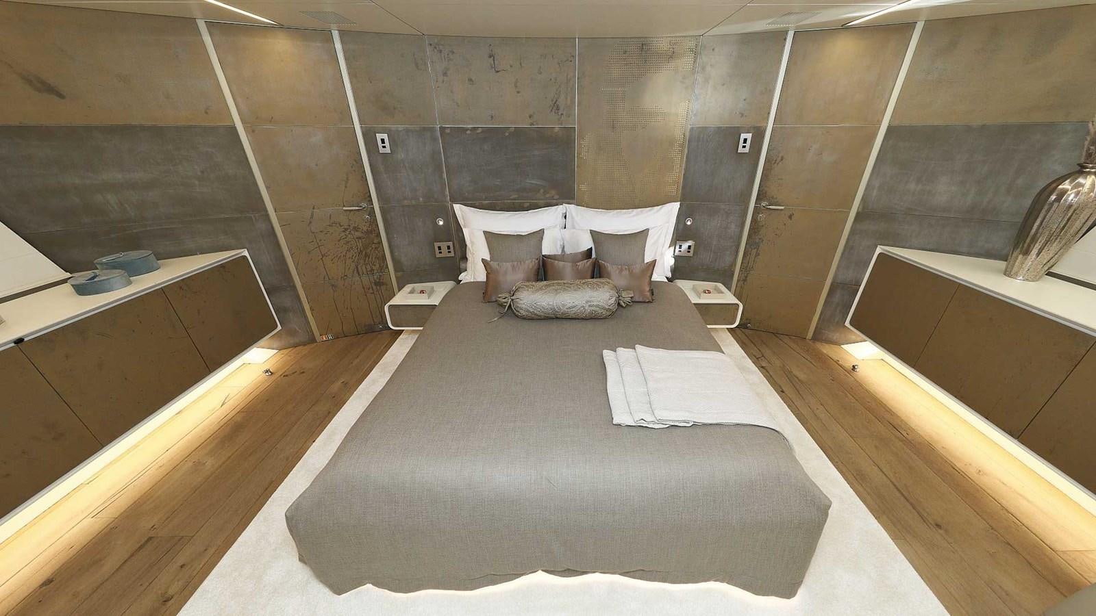 a room with a bed and a sink aboard ANAVI Yacht for Sale