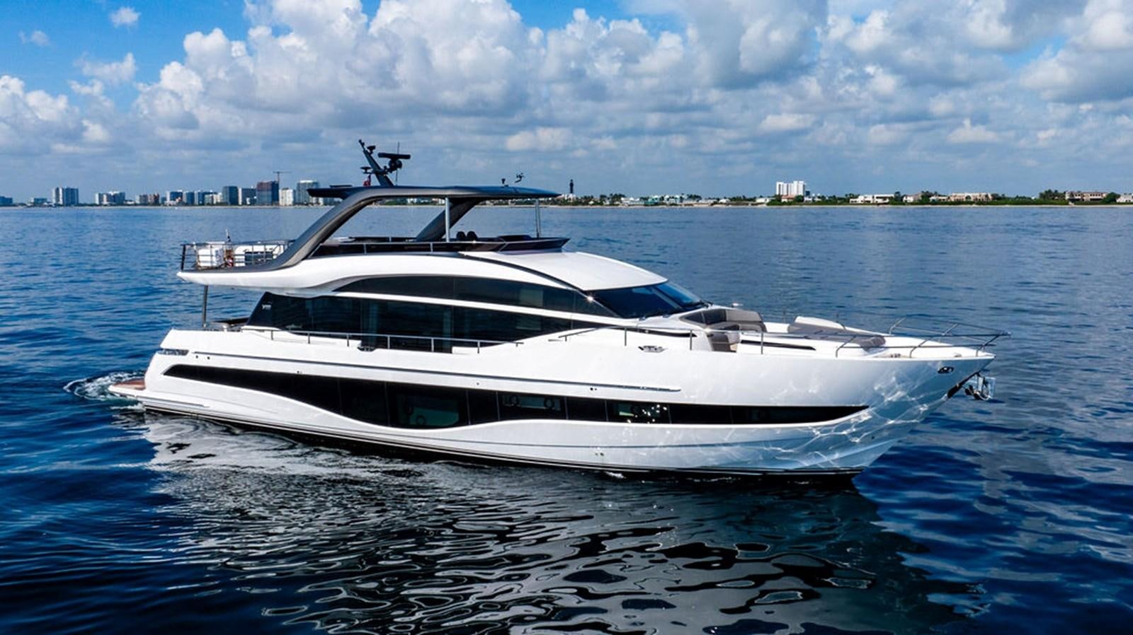 a white yacht in the water aboard TBANK Yacht for Sale