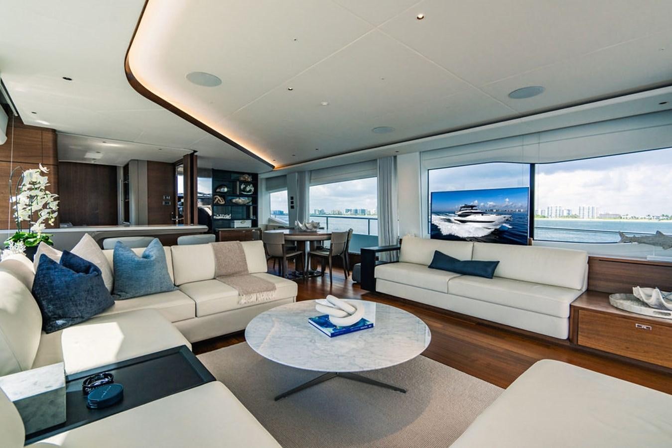 a living room with a large window aboard TBANK Yacht for Sale