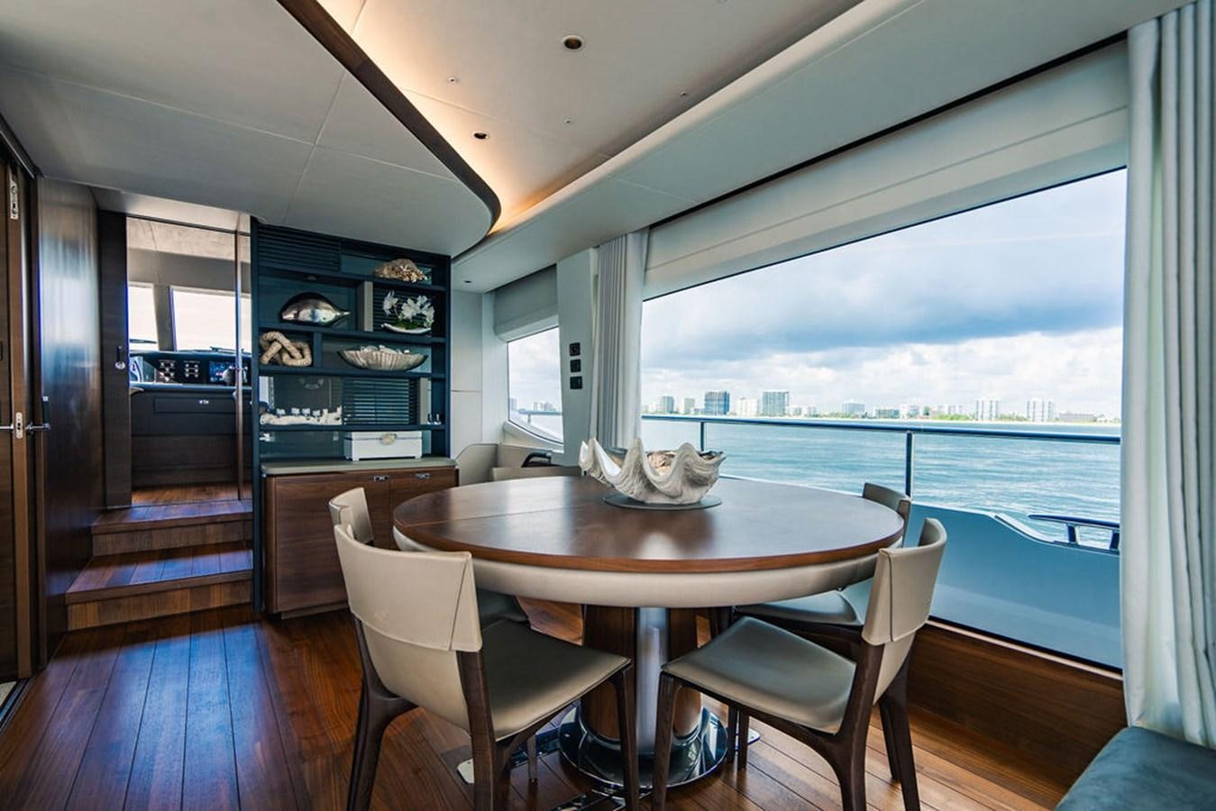 a dining table on a boat aboard TBANK Yacht for Sale