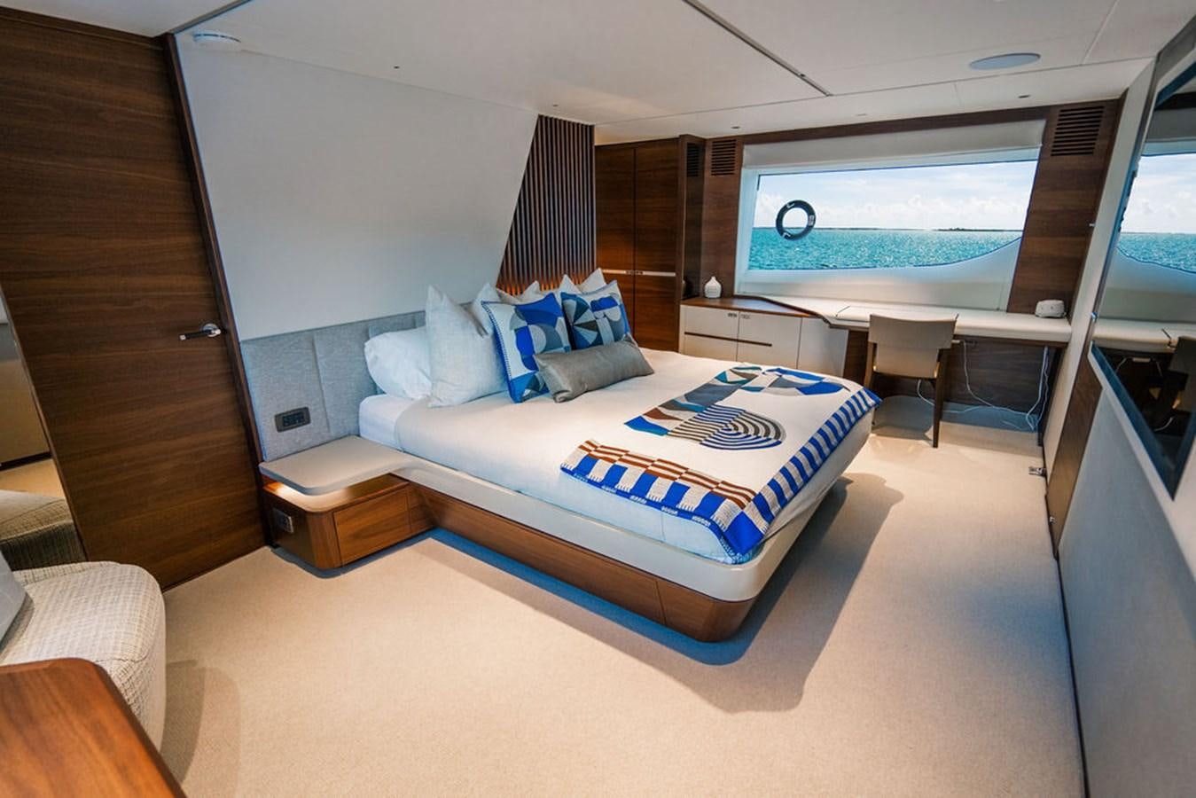 a bed in a room aboard TBANK Yacht for Sale