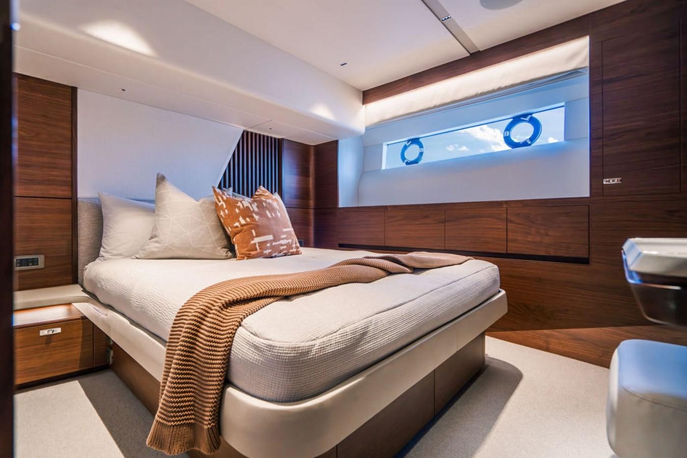 a bed in a room aboard TBANK Yacht for Sale