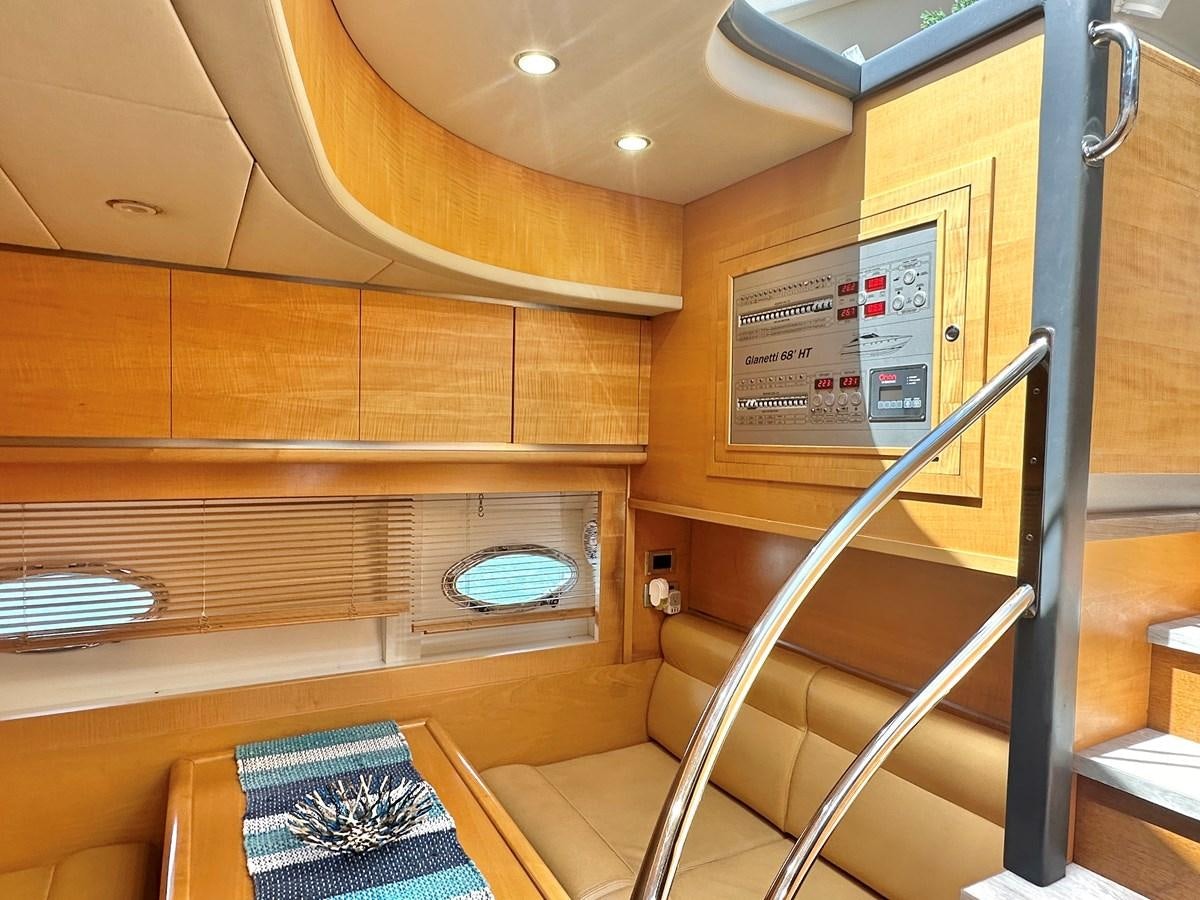 a bunk bed with a sign on the wall aboard NOTORIUS Yacht for Sale
