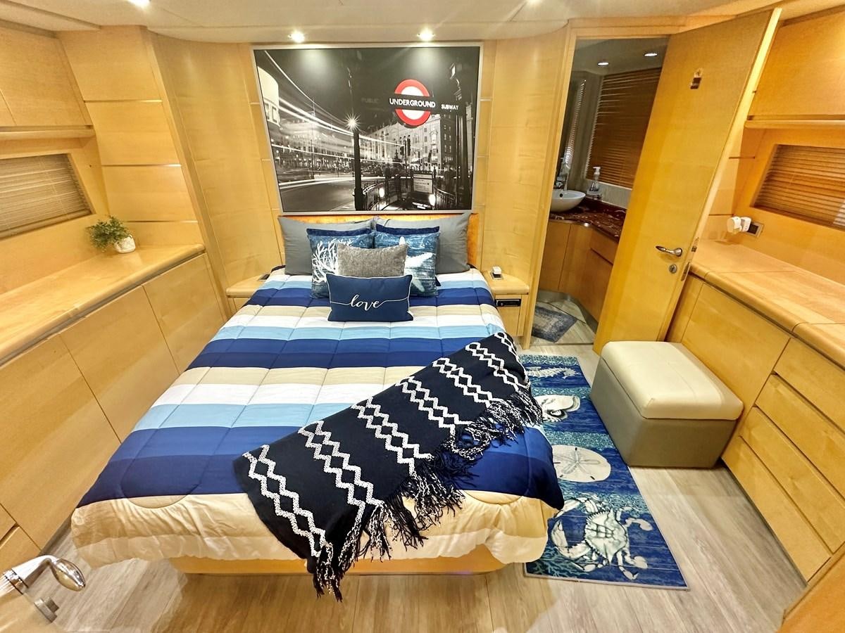a bed in a room aboard NOTORIUS Yacht for Sale