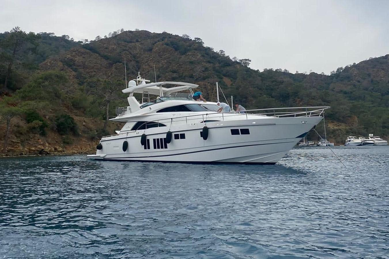 a white boat on the water aboard FAIRLINE SQUADRON 78 2015 Yacht for Sale