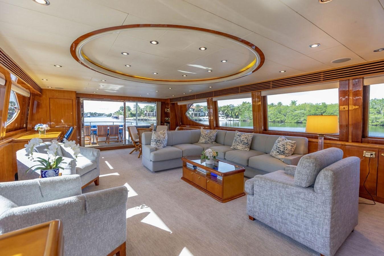 a living room with a large ceiling aboard NO REGRETS Yacht for Sale