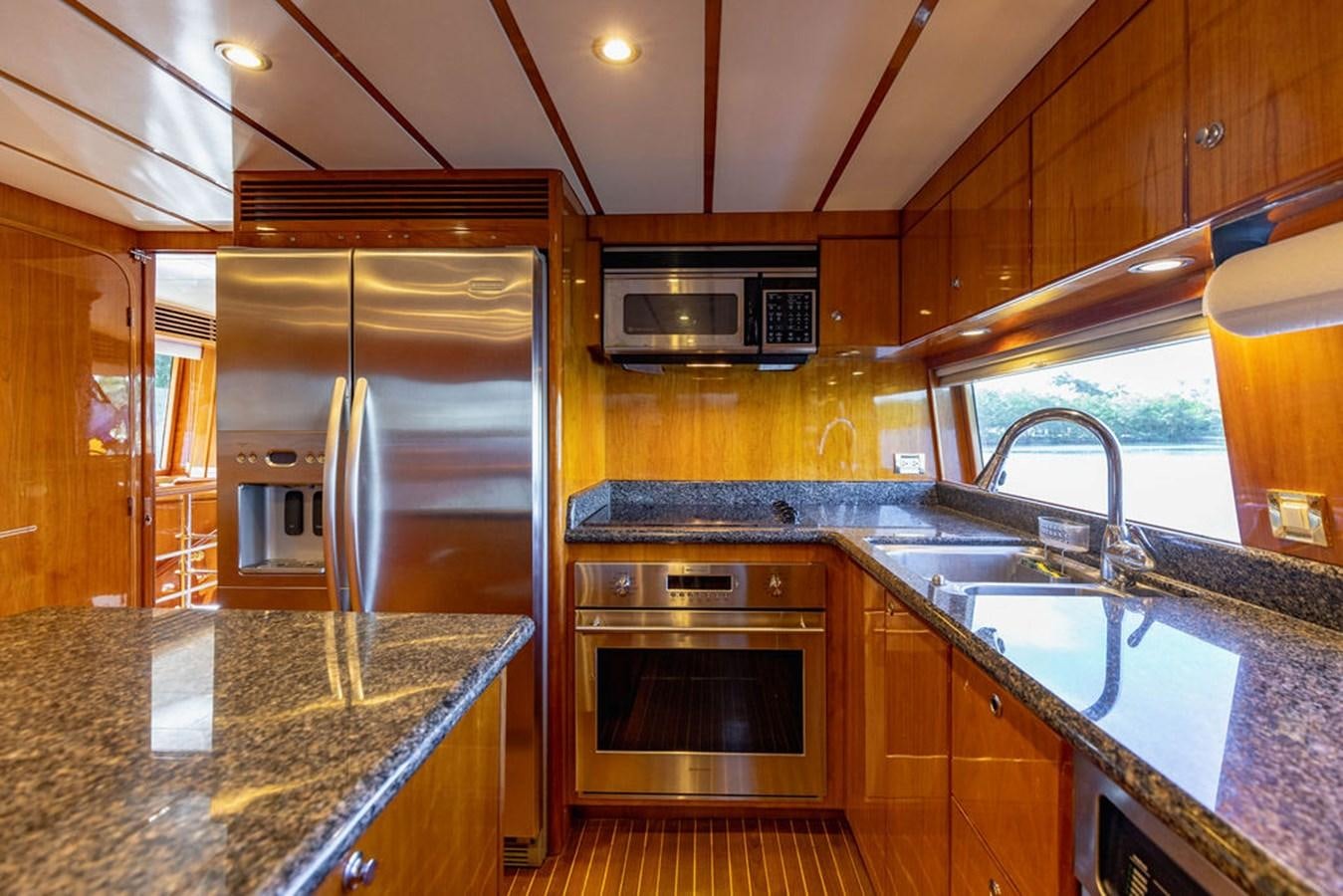 a kitchen with stainless steel appliances aboard NO REGRETS Yacht for Sale