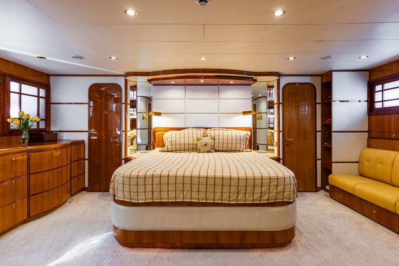 a bed in a room aboard NO REGRETS Yacht for Sale