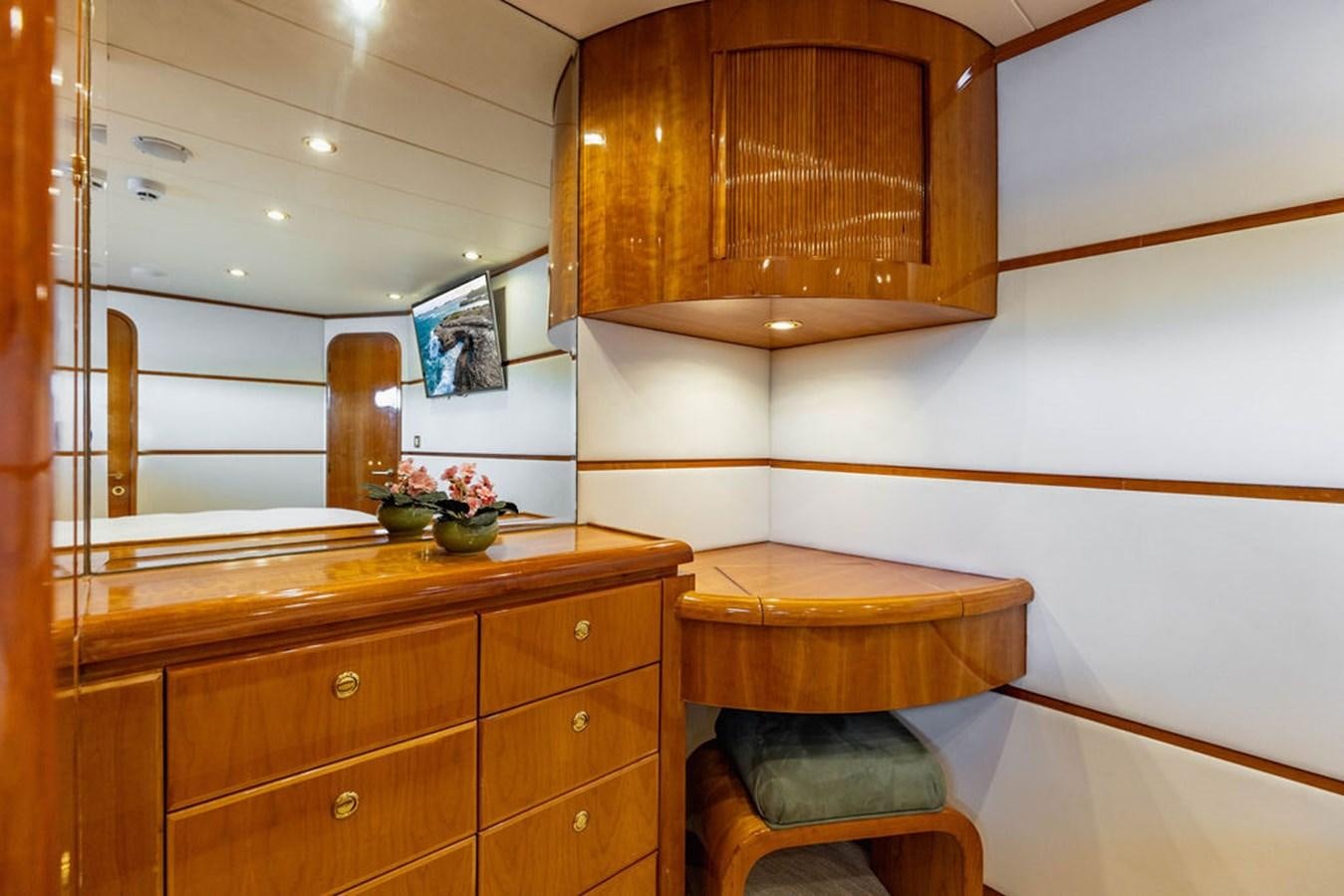 a wooden bathroom with a wooden cabinet aboard NO REGRETS Yacht for Sale