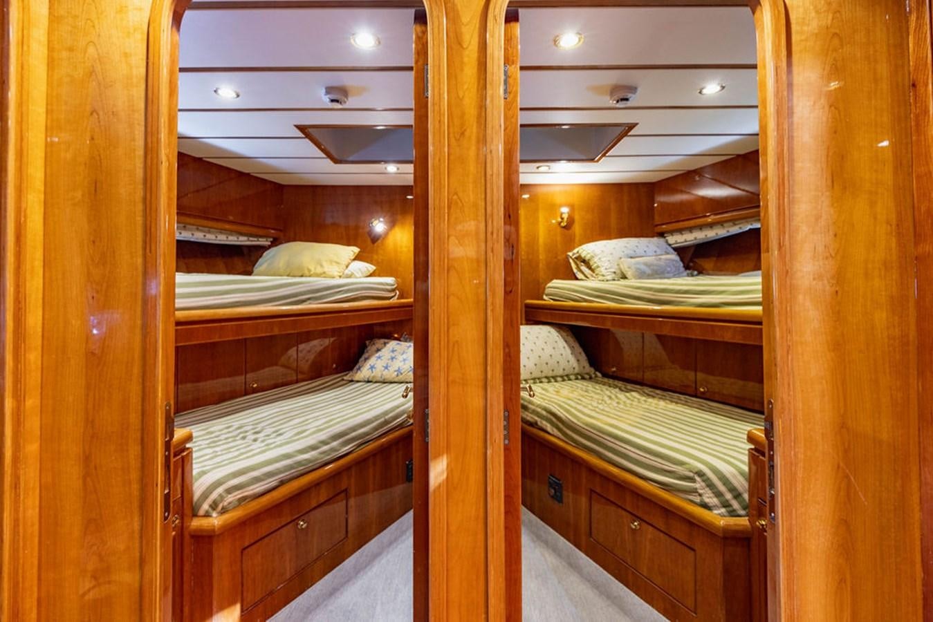 bunk beds in a room aboard NO REGRETS Yacht for Sale