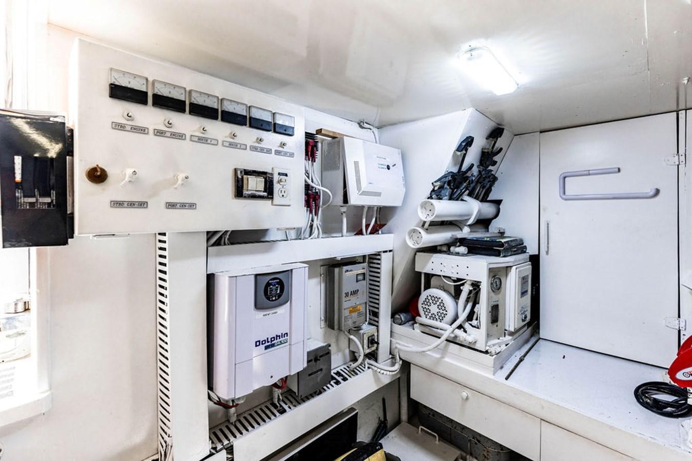 a room with white machines aboard NO REGRETS Yacht for Sale