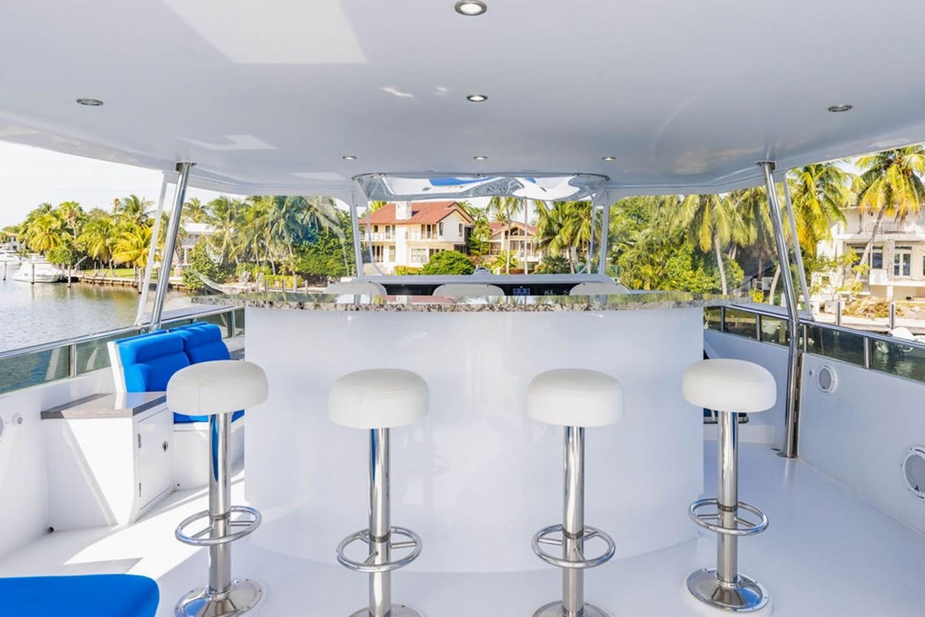 a group of stools on a boat aboard NO REGRETS Yacht for Sale