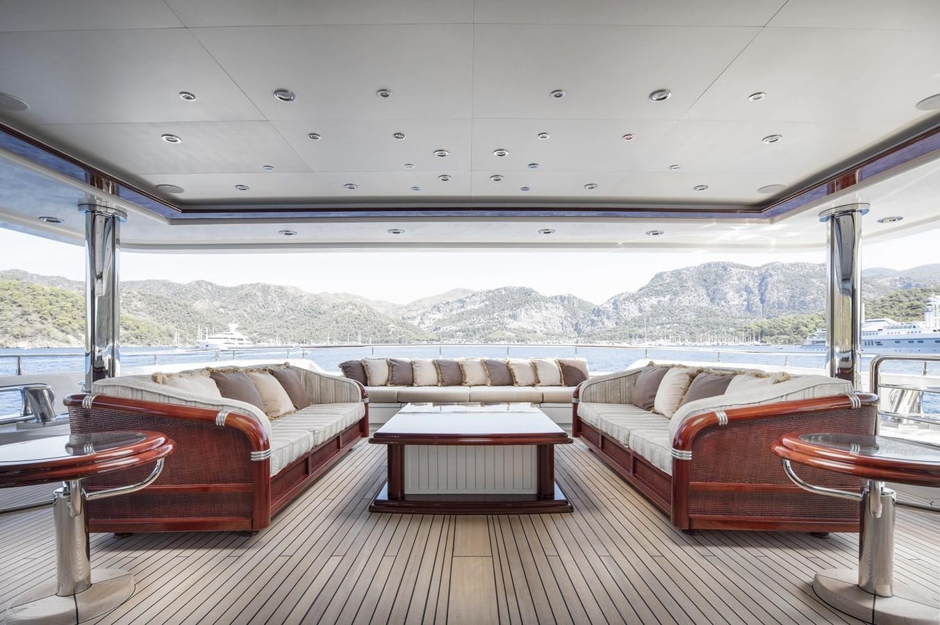 a room with a couch and a table and a bed aboard RICHAR Yacht for Sale