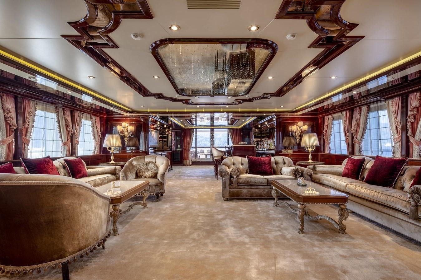 a large living room with a large chandelier aboard RICHAR Yacht for Sale