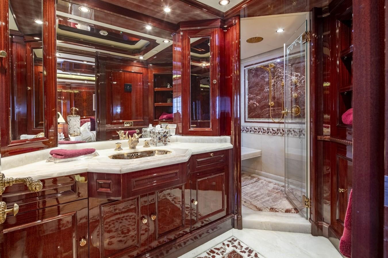 a bathroom with a countertop sink and cabinets aboard RICHAR Yacht for Sale