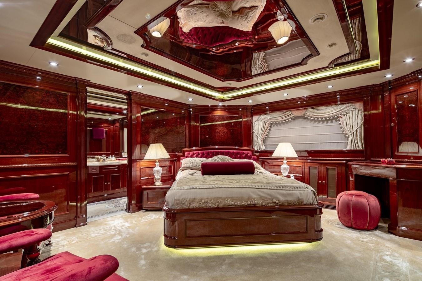 a large bedroom with a large bed aboard RICHAR Yacht for Sale