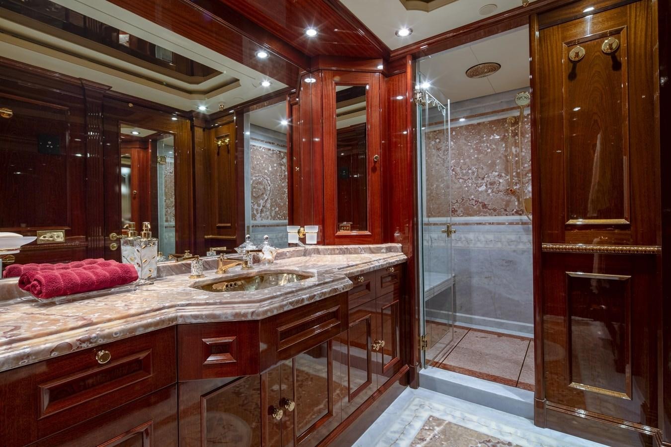 a bathroom with a large mirror aboard RICHAR Yacht for Sale