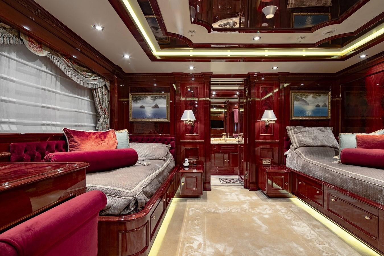 a room with a bed and a couch aboard RICHAR Yacht for Sale