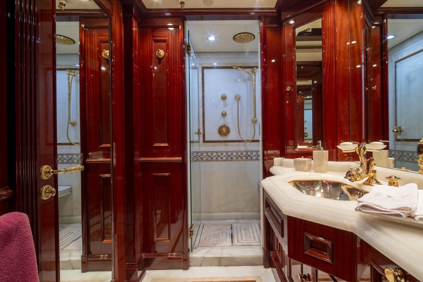 a bathroom with a sink and a mirror aboard RICHAR Yacht for Sale