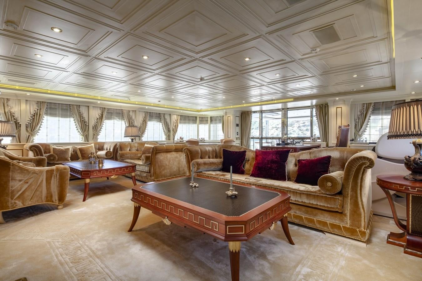 a living room with a large sofa aboard RICHAR Yacht for Sale