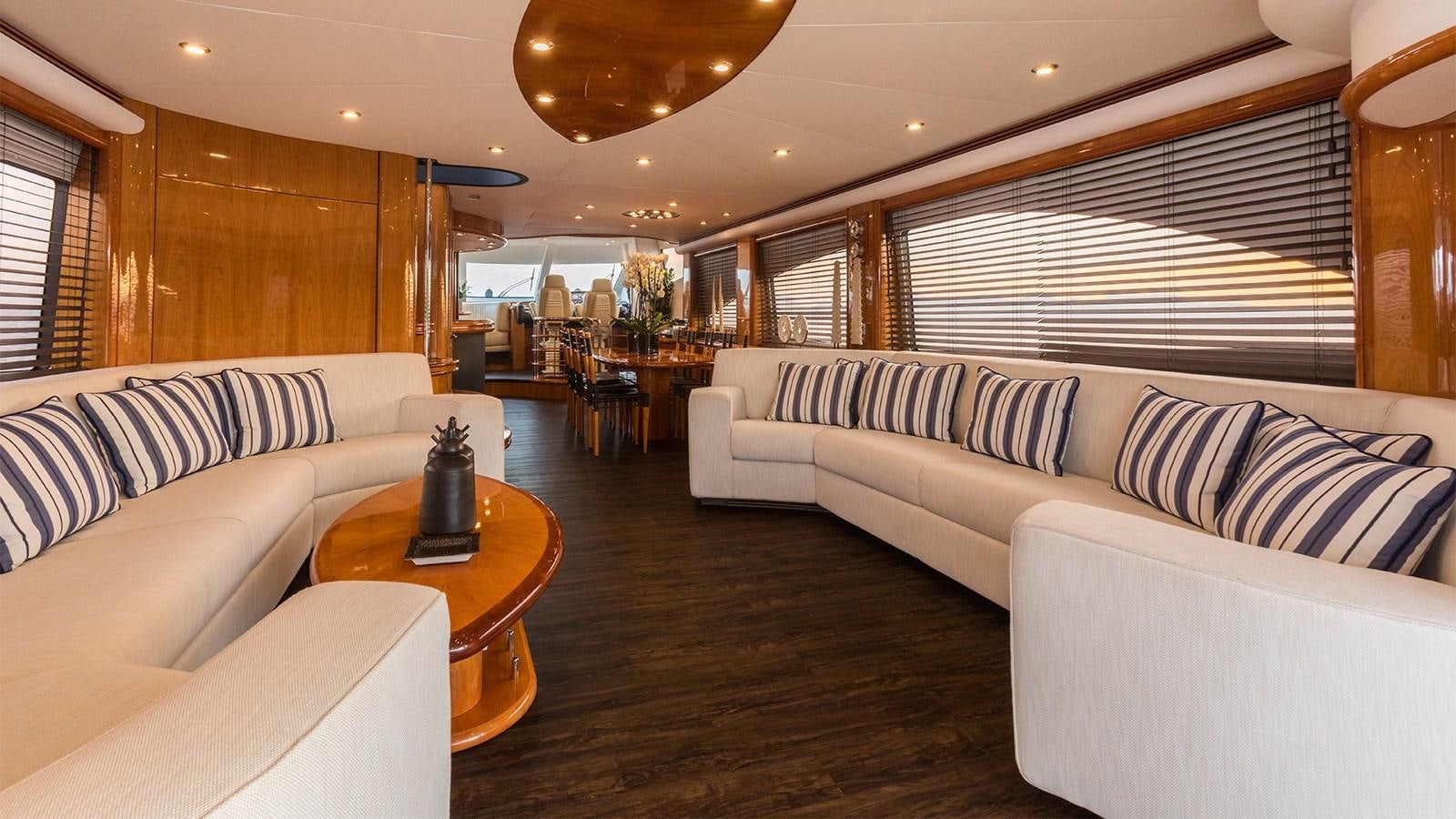 a living room with a couch and a coffee table aboard WINNING STREAK 2 Yacht for Sale