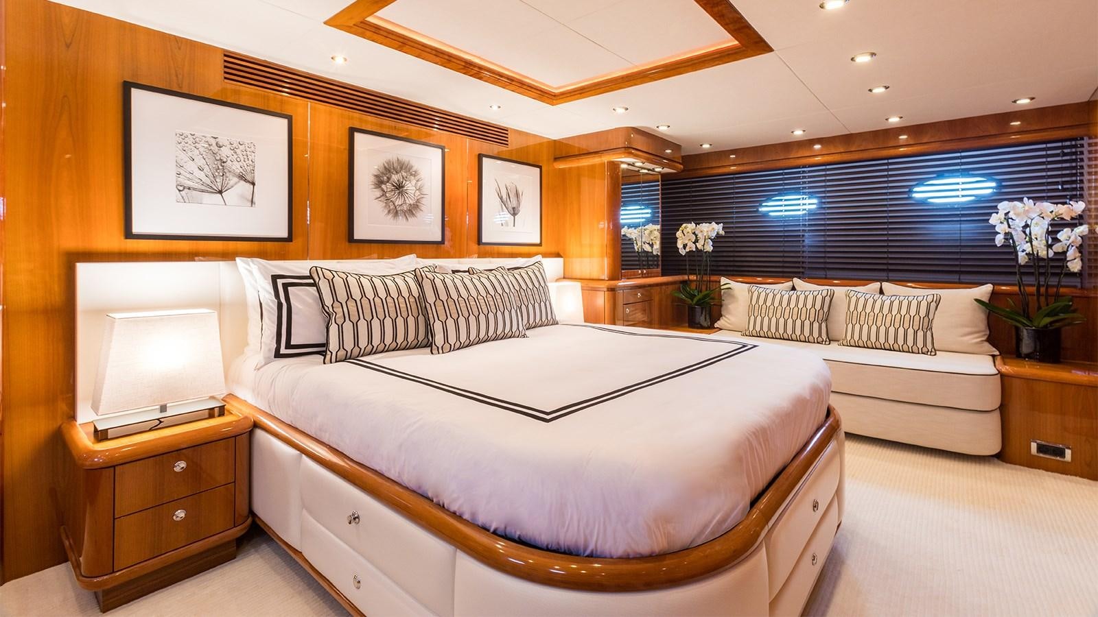 a room with a bed and a tv aboard WINNING STREAK 2 Yacht for Sale