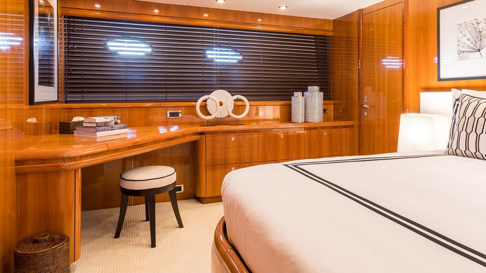 a bed and desk in a room aboard WINNING STREAK 2 Yacht for Sale