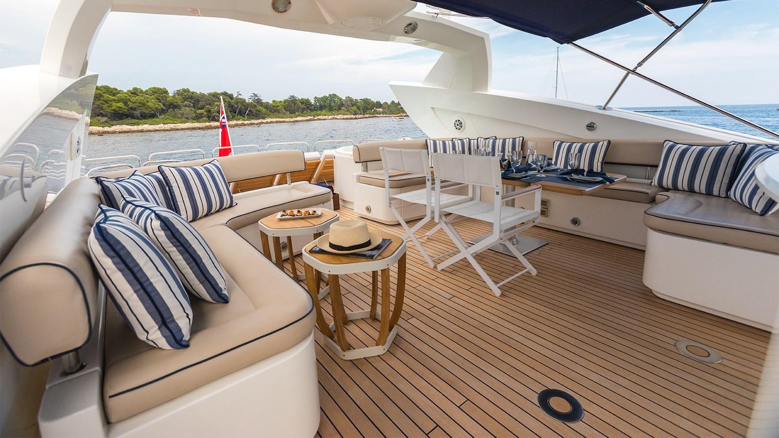 a boat with a table and chairs aboard WINNING STREAK 2 Yacht for Sale