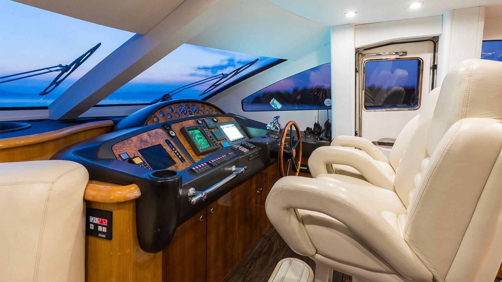 a black and gold machine on a wooden table aboard WINNING STREAK 2 Yacht for Sale
