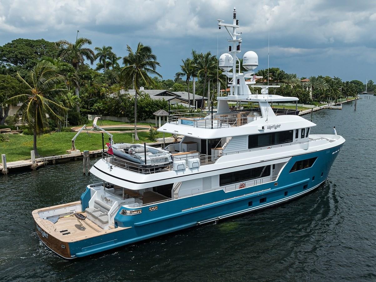 a boat docked at a pier aboard UPTIGHT Yacht for Sale